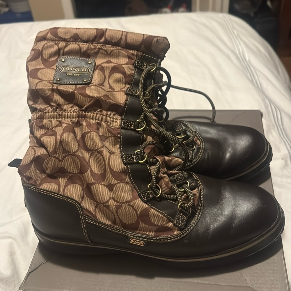 Coach boots size 10, brown with logo.  Laced in the front.